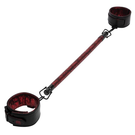 Pedeset nijansi sive - šipka za širenje nogu sa stezaljkom (crno-crvena)